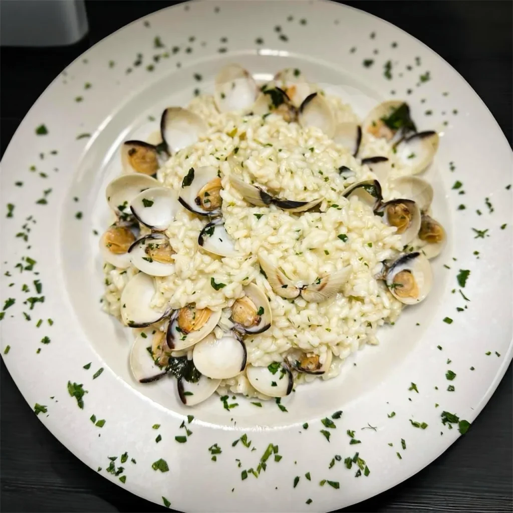 Risotto con conchiglie e prezzemolo — VIBES